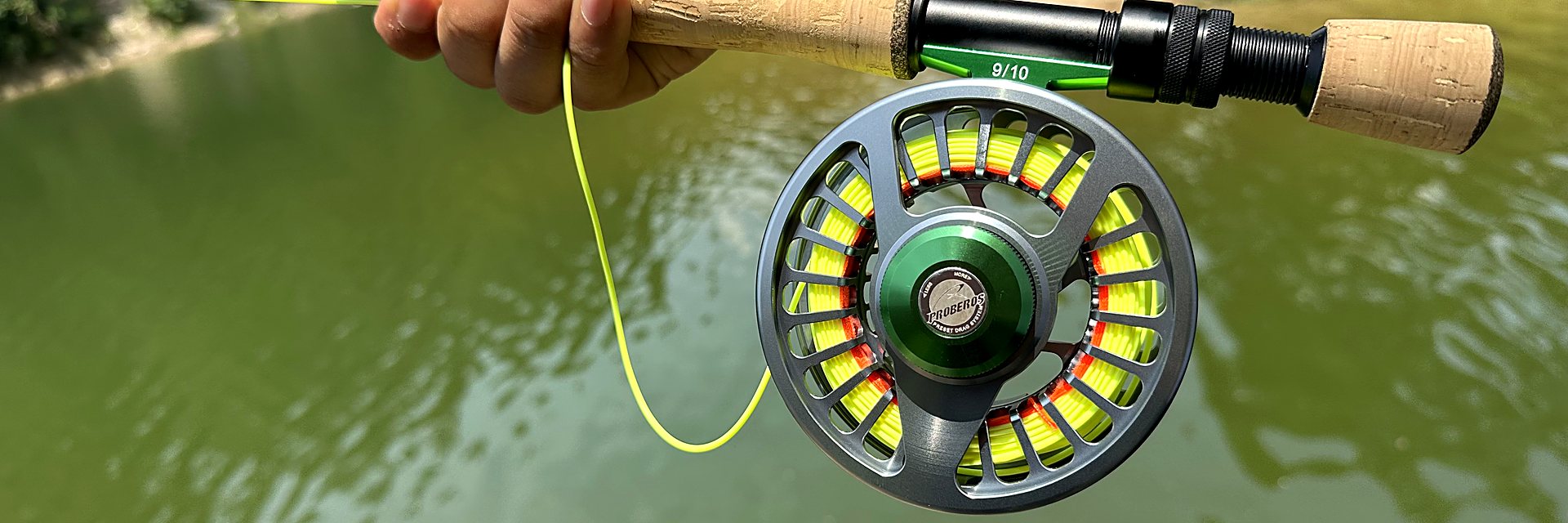 KATYUSHA fly reel rigged and ready by the water
